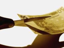 tijeras-recortando-billete-euros